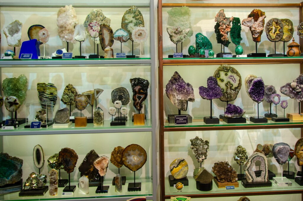 Shelves of crystals and minerals on stands at Fe2 Crystal Gallery, Phuket