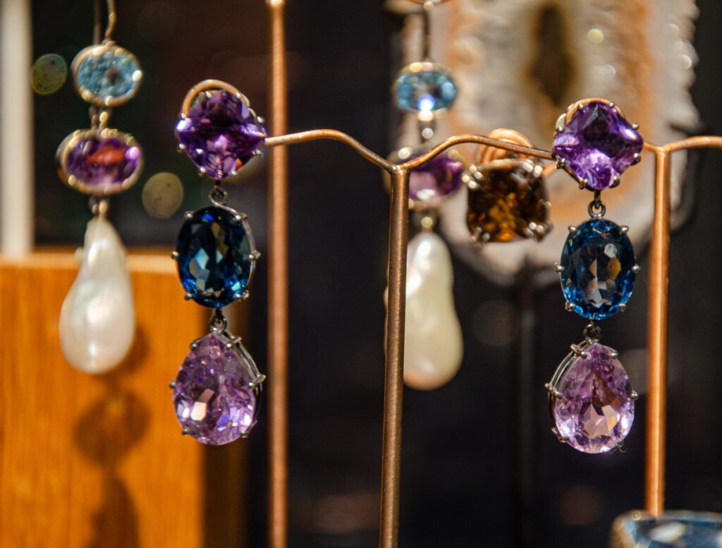 Drop earrings with purple and blue faceted stones and baroque pearls